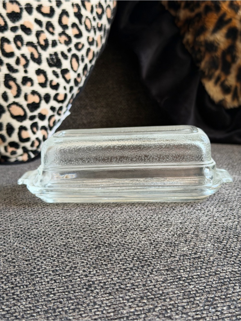 Small sized glass covered butter dish